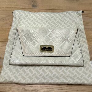 Diane Von Furstenberg white clutch in good condition with dustbag